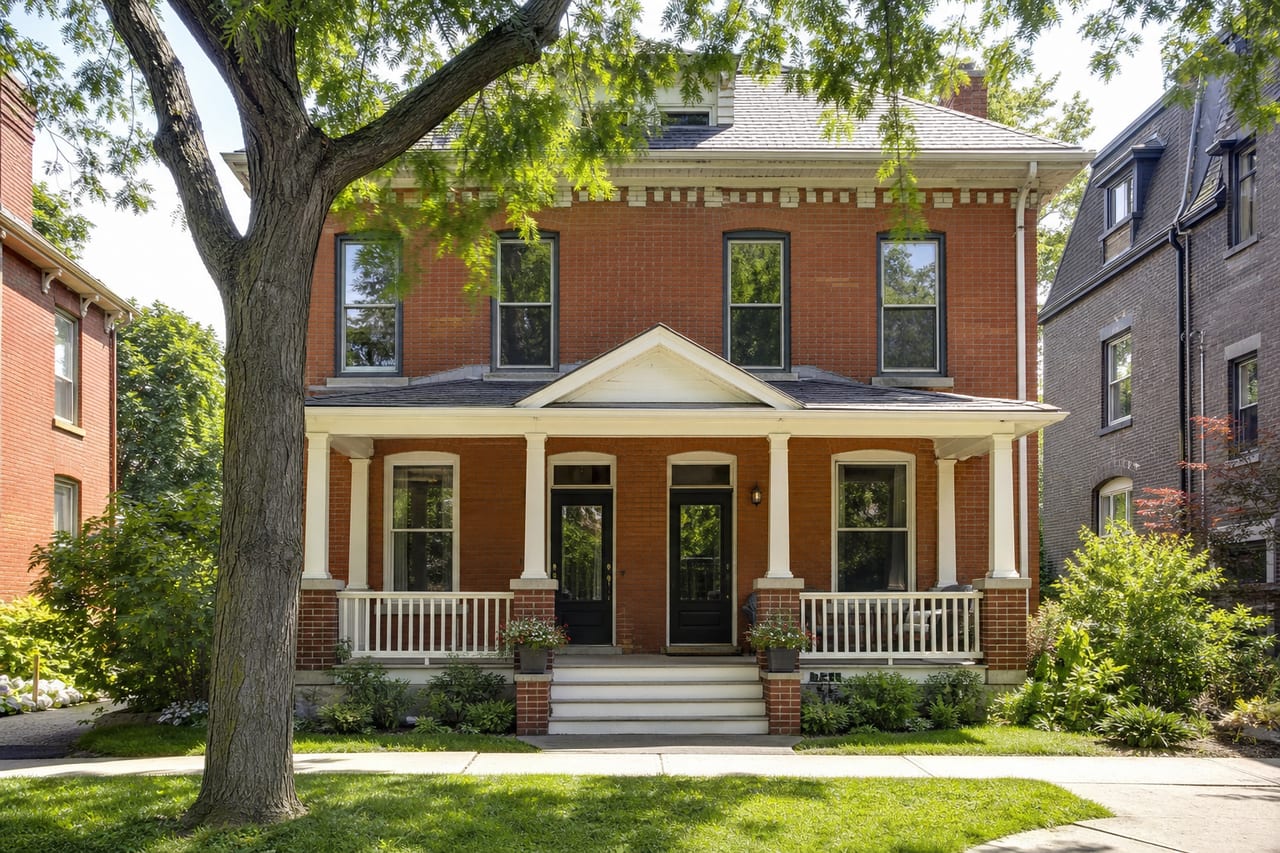 The brick duplex from the street